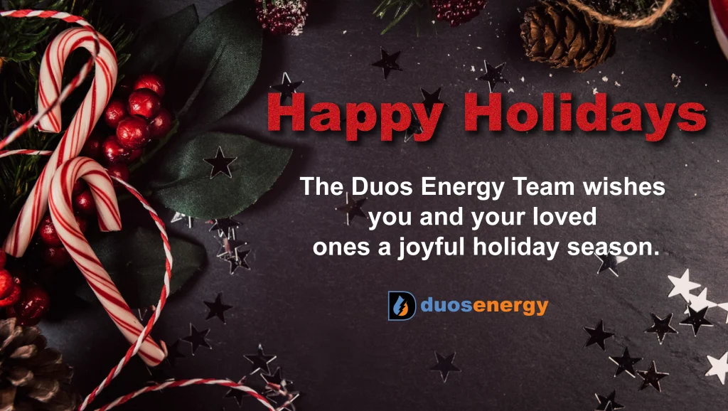 Candy canes and greenery on a dark background with text that reads: Happy Holidays. The Duos Energy Team wishes you and your loved ones a joyful holiday season.
