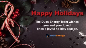 Candy canes and greenery on a dark background with text that reads: Happy Holidays. The Duos Energy Team wishes you and your loved ones a joyful holiday season.